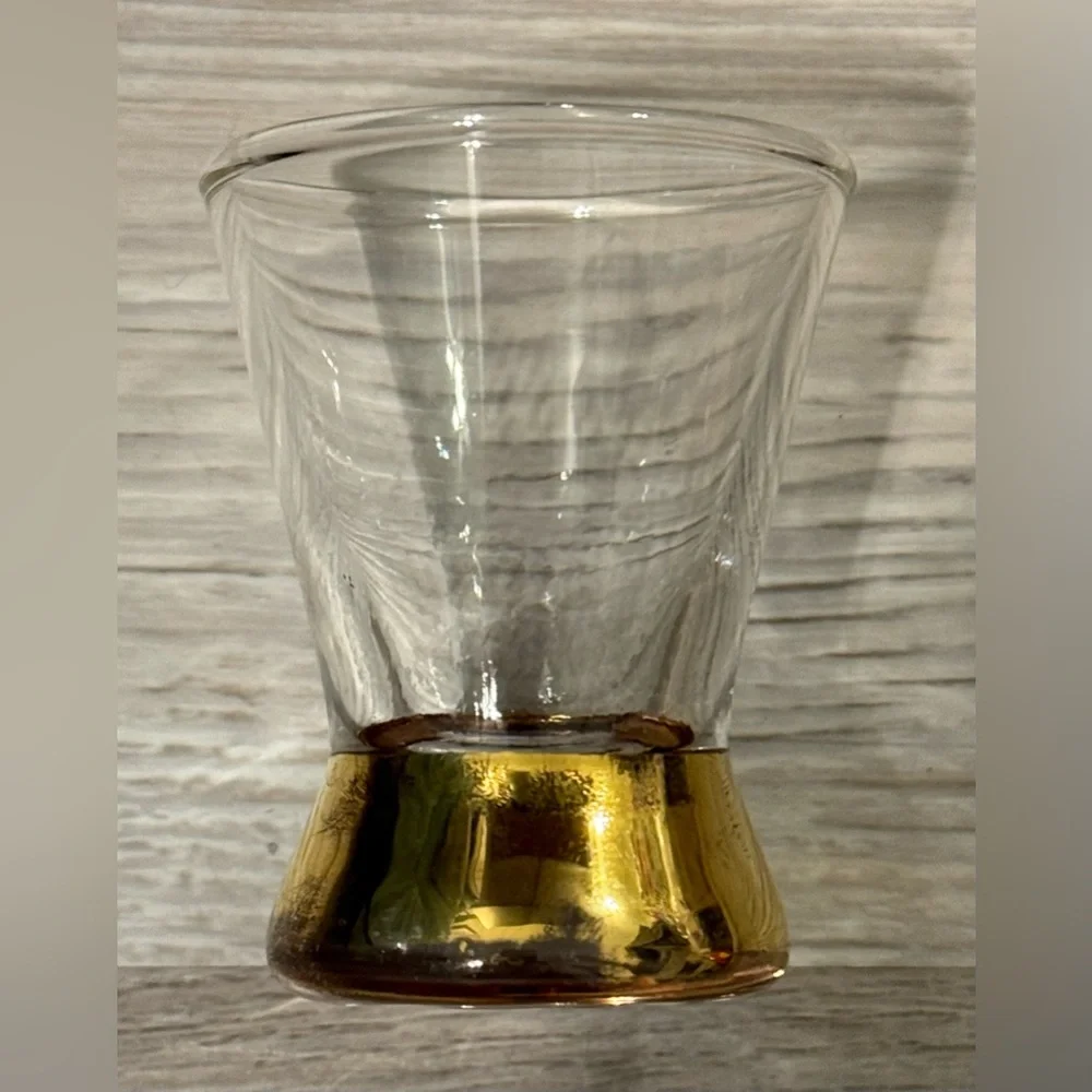Vintage shot glass. The stem is plated with 22-karat gold.